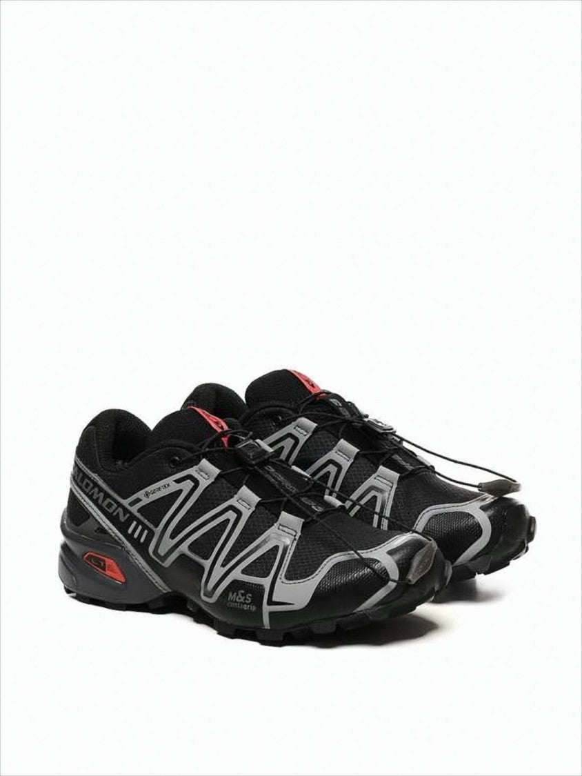 Athletic Sneakers with Streamlined Silhouette and Unique Overlays