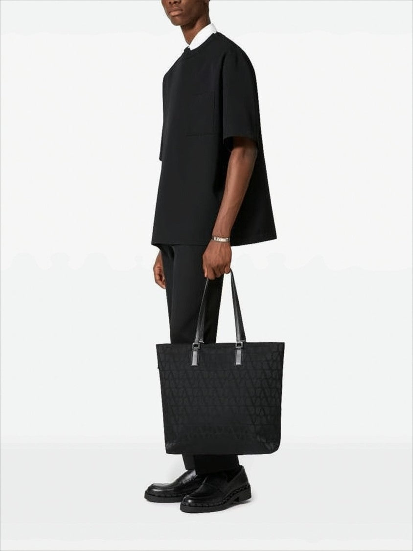 Structured Black Tote Bag with Embossed Logo Motif