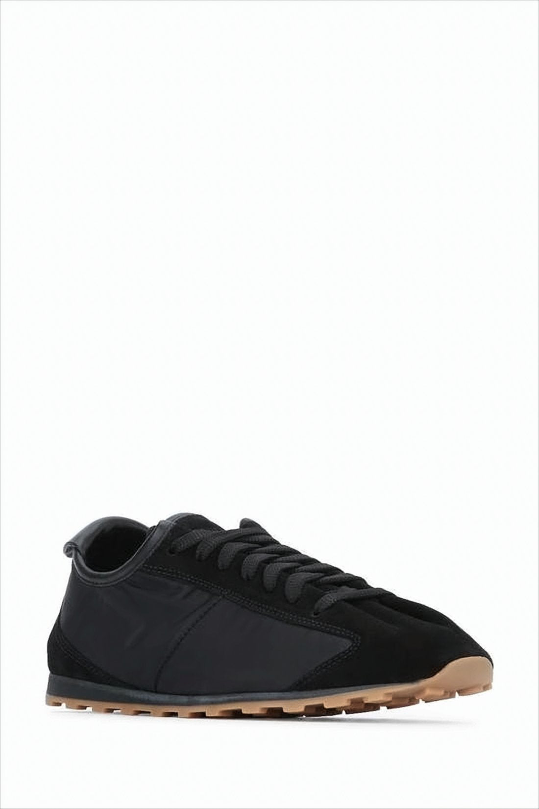 Low-Profile Black Sneakers with Textured Details