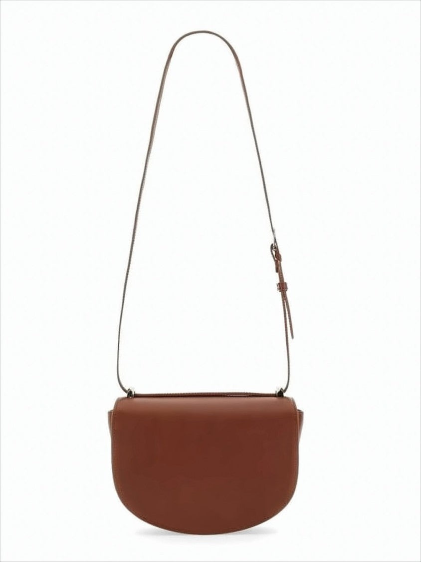 Skórzana torebka crossbody o sztywnej konstrukcji w kolorze głębokiego brązu