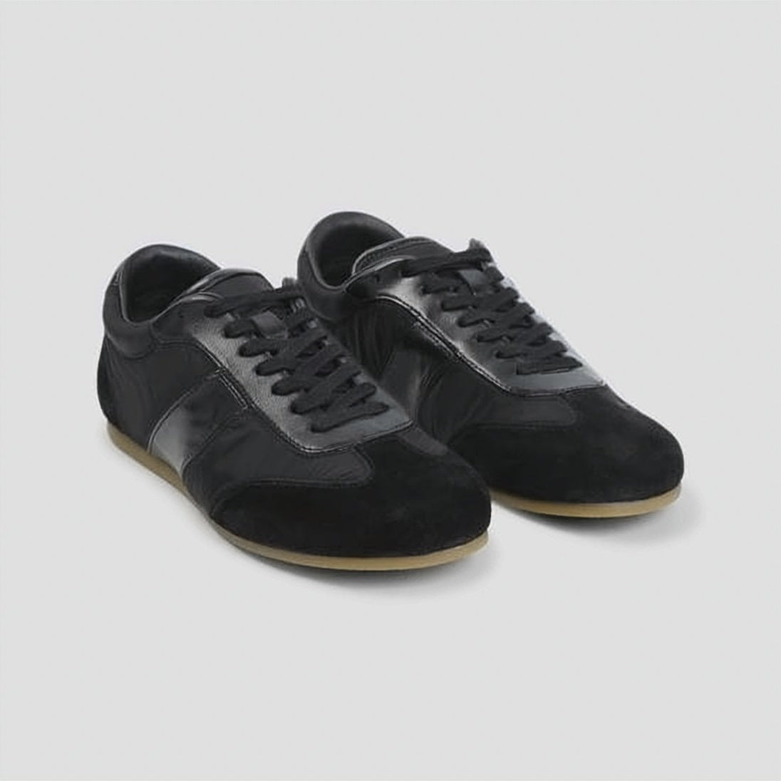 Low-Profile Black Sneakers with Smooth