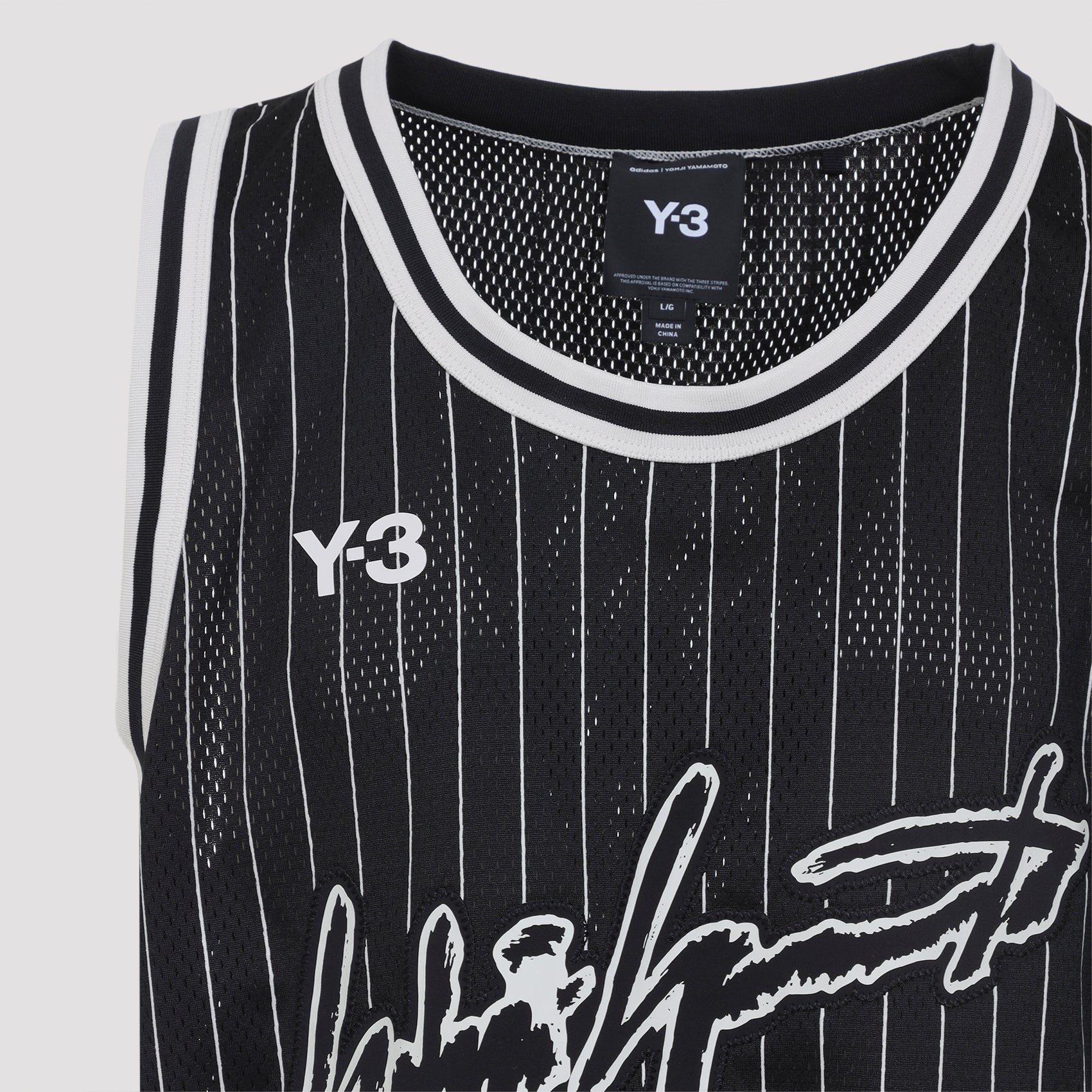 Sleeveless Black Sports Jersey With White Pinstripes And Signature Graphic