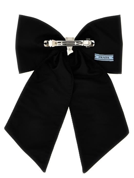 Large Black Fabric Bow Hair Accessory with Triangular Logo Plaque