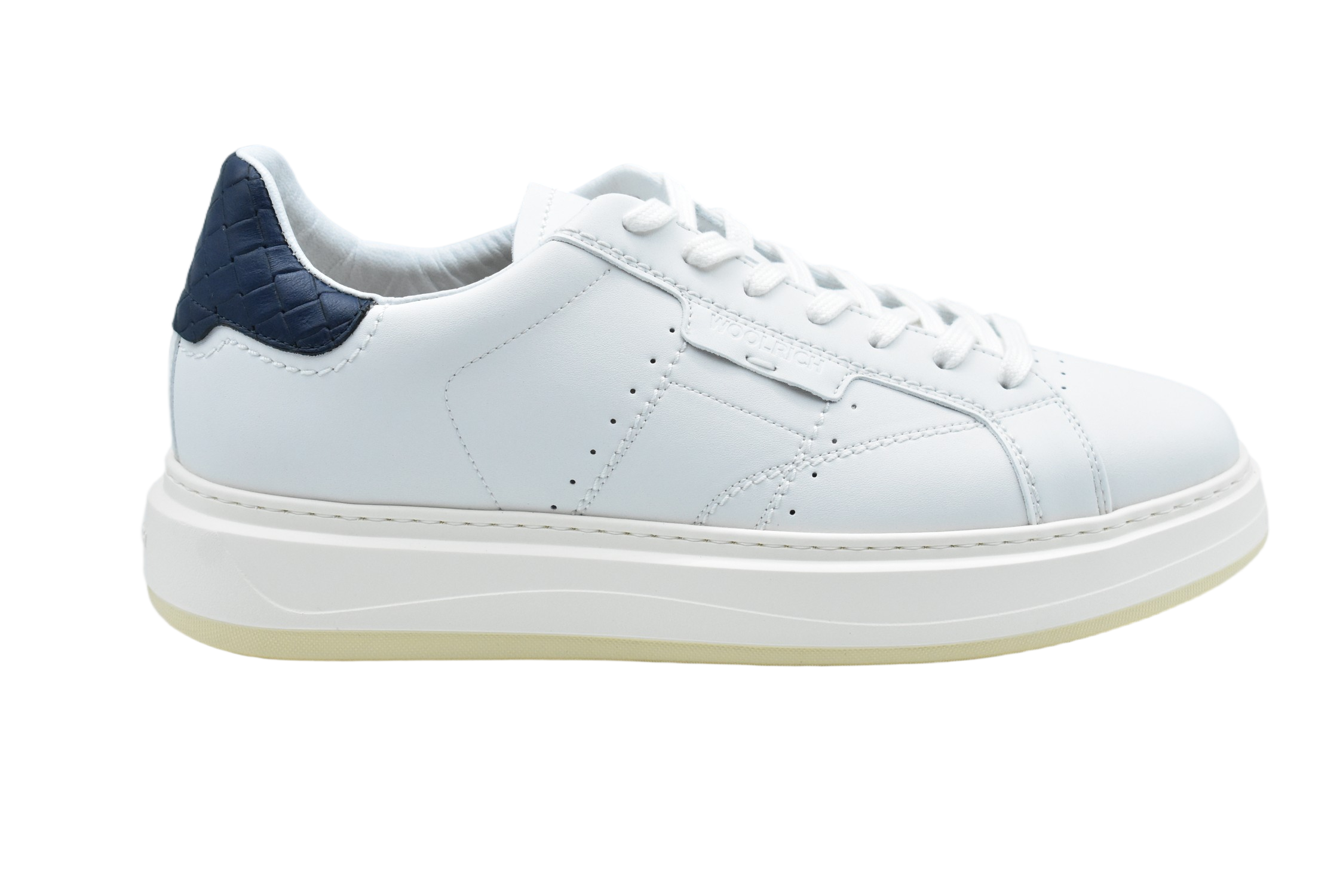 Low-Top Sneakers With Textured Accents And Elevated Sole