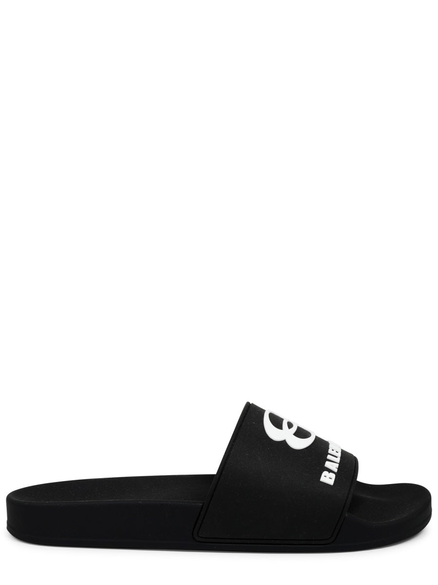 Contoured Black Slip-On Sandal With Bold Logo Print