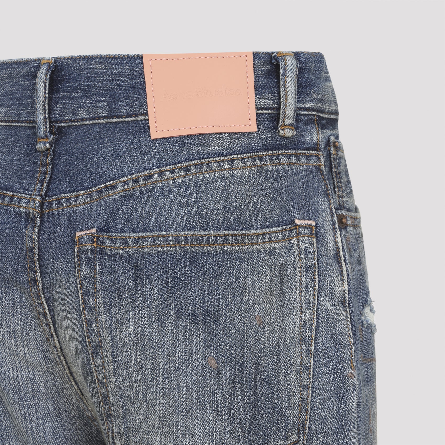 High-Waisted Flared Jeans With Faded Blue Wash And Distressing