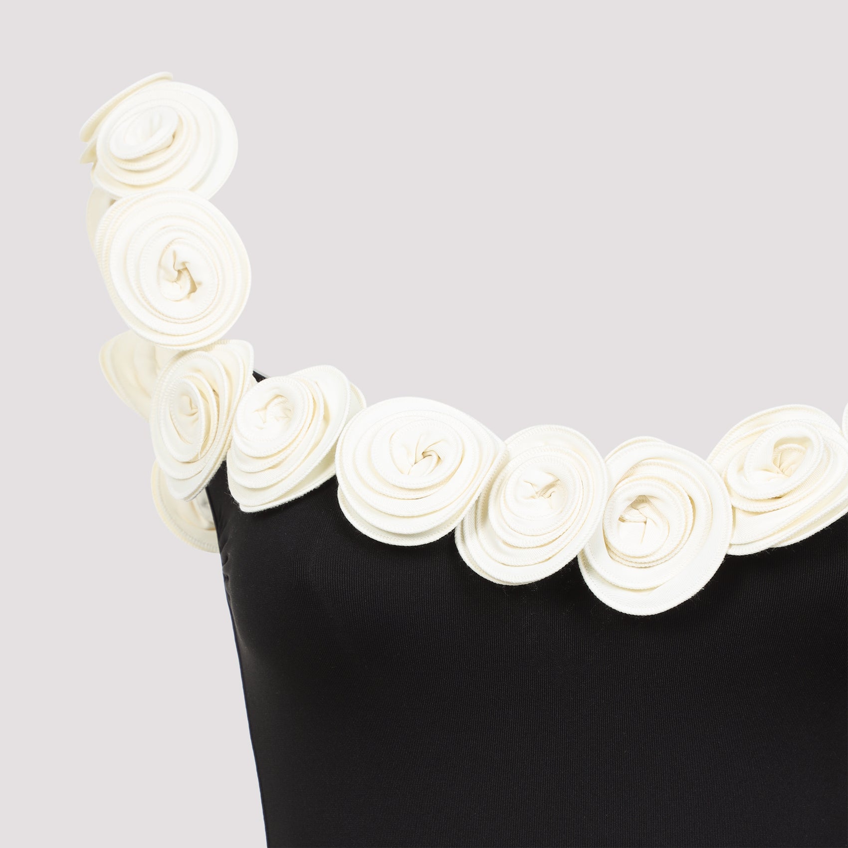 Swimwear With Decorative Rosettes And Flattering Fit