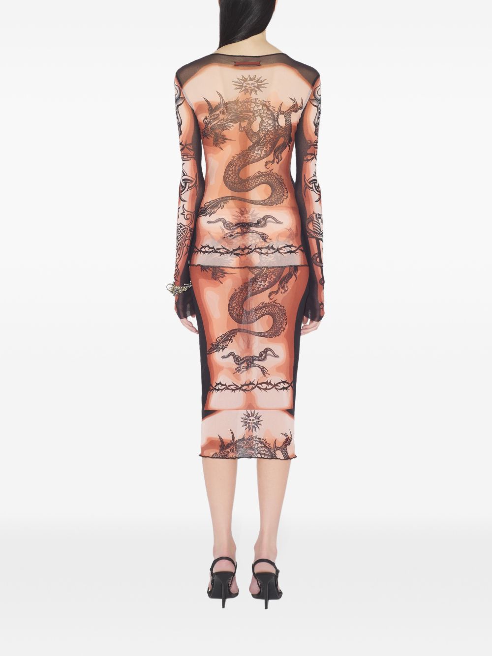 Tattoo-Inspired Sheer Long-Sleeved Top With Bold Motifs
