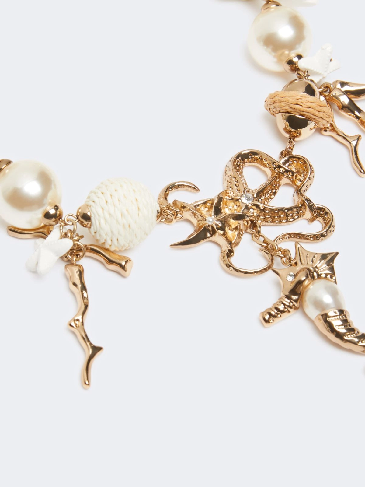 Statement Necklace with Coral-Inspired Gold Elements