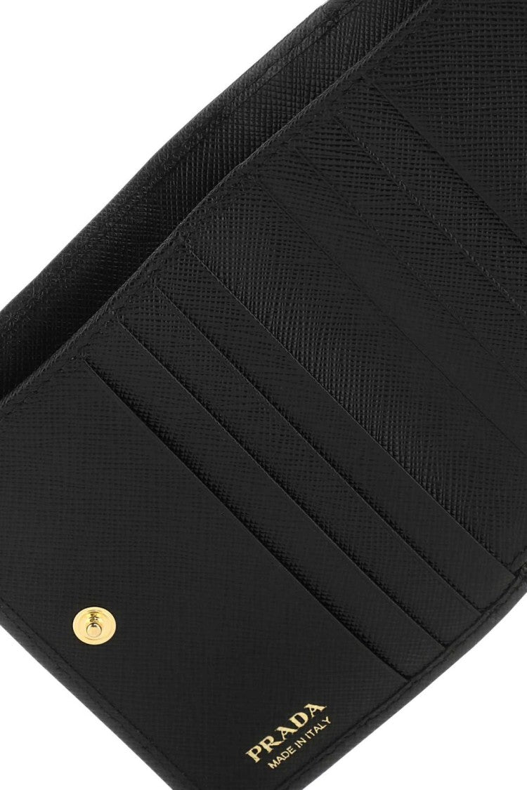 Compact Black Zip Wallet with Triangular Logo Plaque