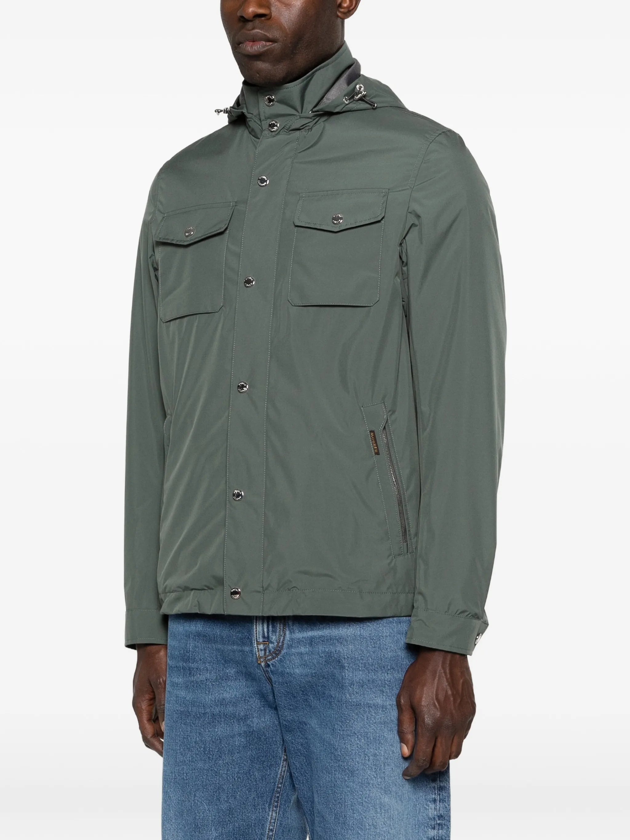 Muted Green Jacket With Adjustable Hood And Functional Pockets