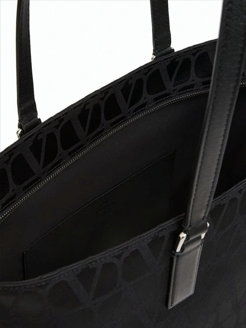 Structured Black Tote Bag with Embossed Logo Motif
