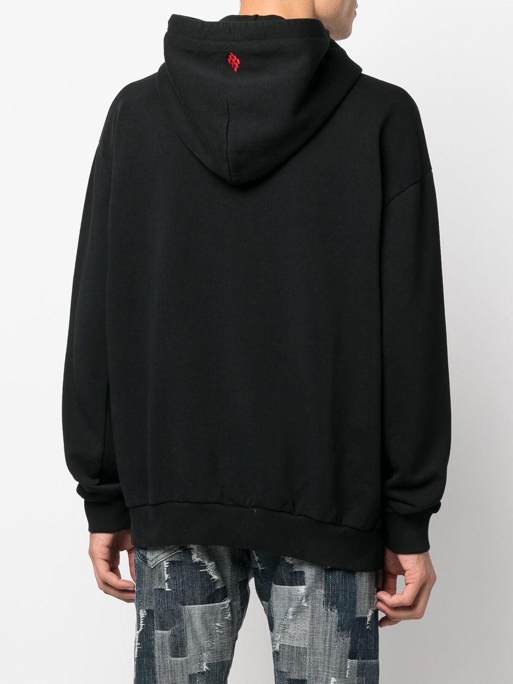 Black Feathers Necklace Over Cotton Hoodie