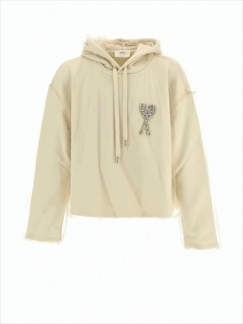 Krótka bluza z kapturem i wyszytym logo w kształcie serca