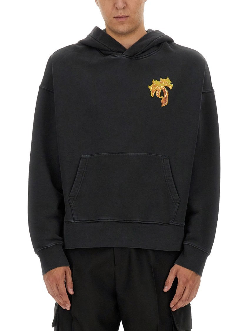 Relaxed Fit Black Hoodie With Vibrant Graphic Design