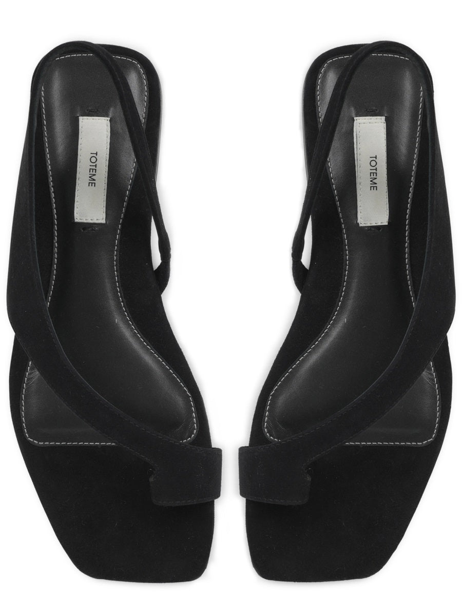 Sleek Suede Sandal With Unique Toe Loop Strap