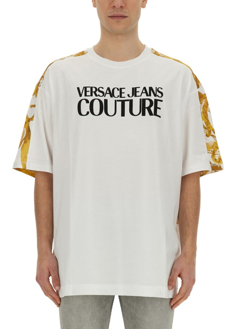 Oversized T-Shirt With Bold Logo And Intricate Patterned Sleeves