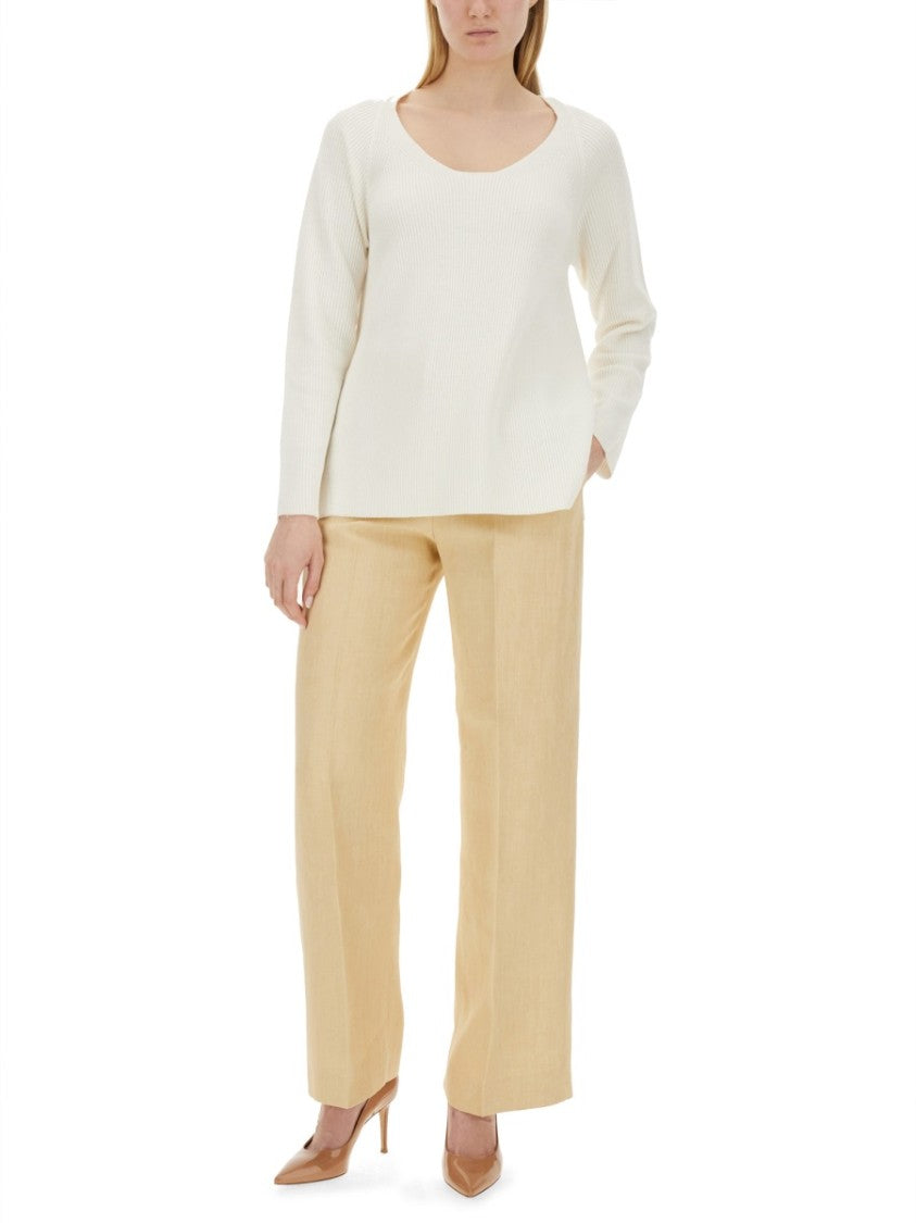 V-Neck Sweater With Ribbed Texture And Side Slits