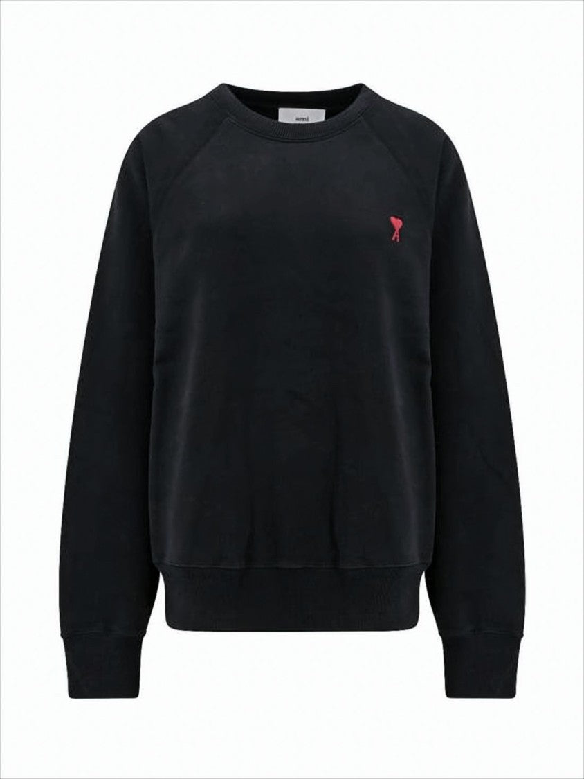 Black Long-Sleeve Top With Classic Crew Neckline And Ribbed Cuffs