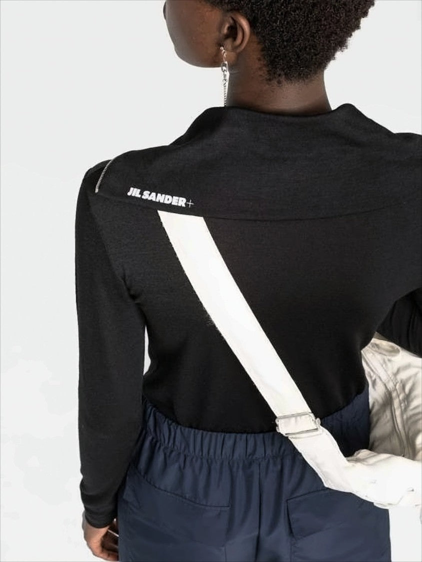 Fitted Turtleneck with Half-Zip Closure and Subtle Branding