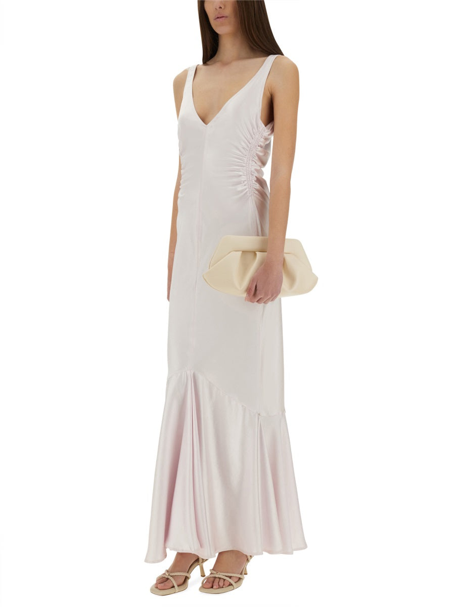Long Dress With Deep V-Neckline And Flared Hem