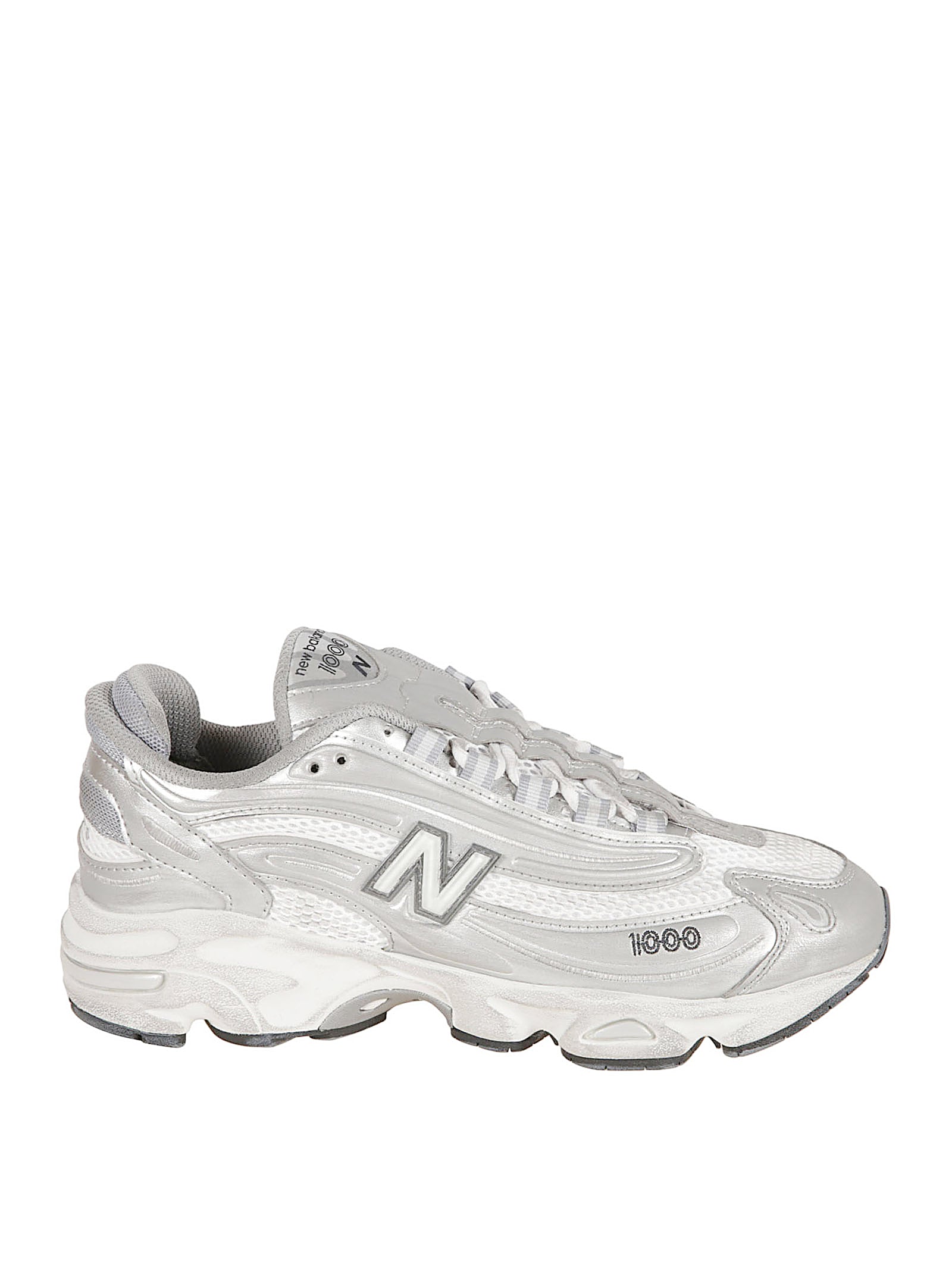 Streamlined Silver Sneakers With Textured Sole