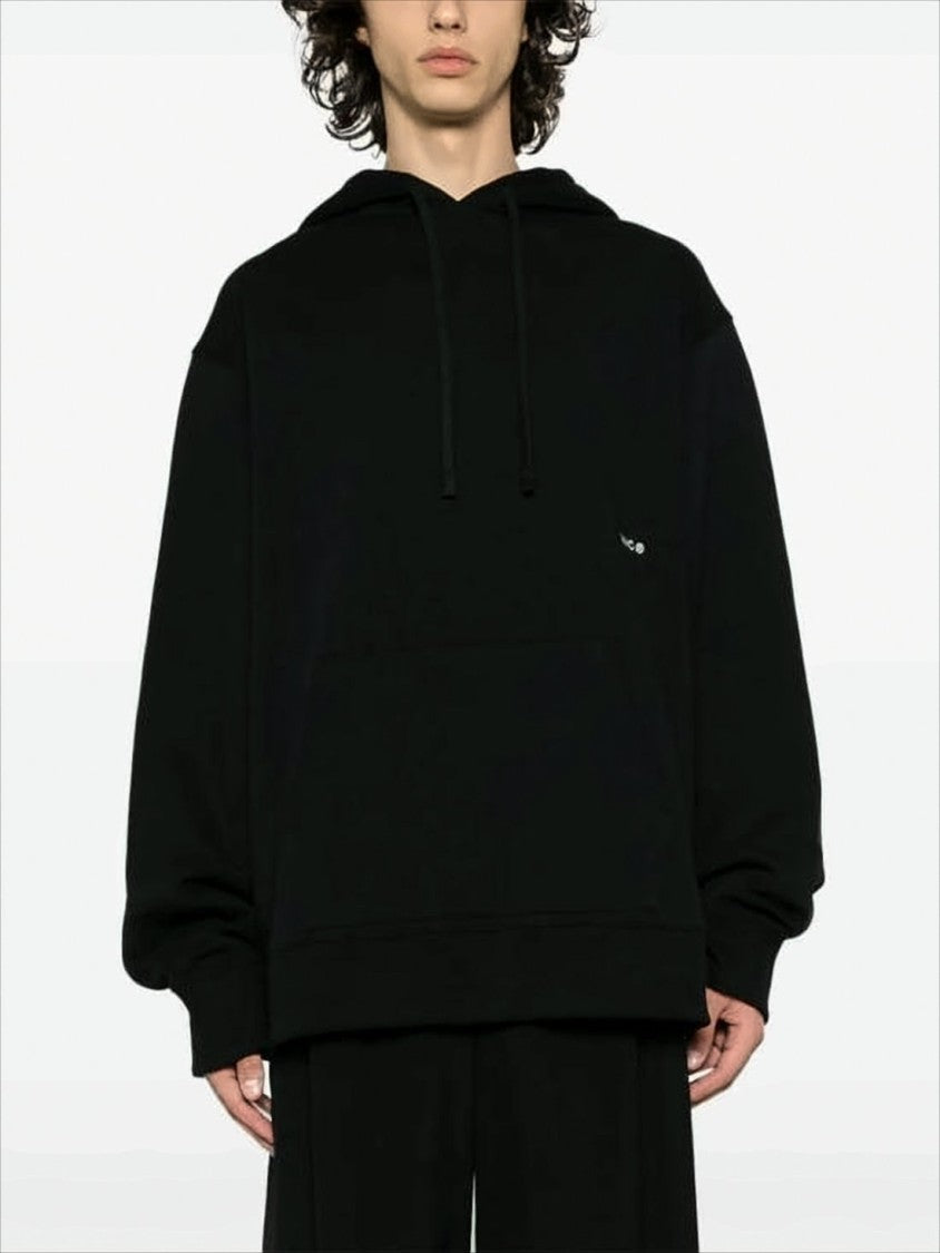 Relaxed-Fit Black Hoodie with Circular Graphic Design
