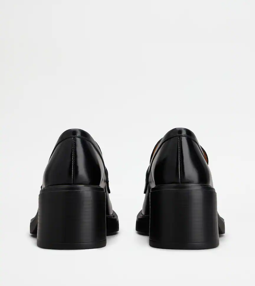 Refined Black Calfskin Loafers With Timeless Design
