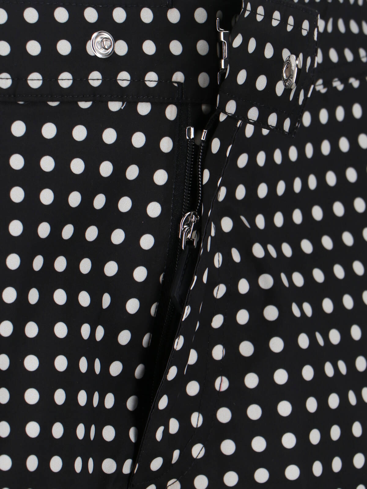 Minimalist Black Apparel With Smooth Texture And Clean Lines