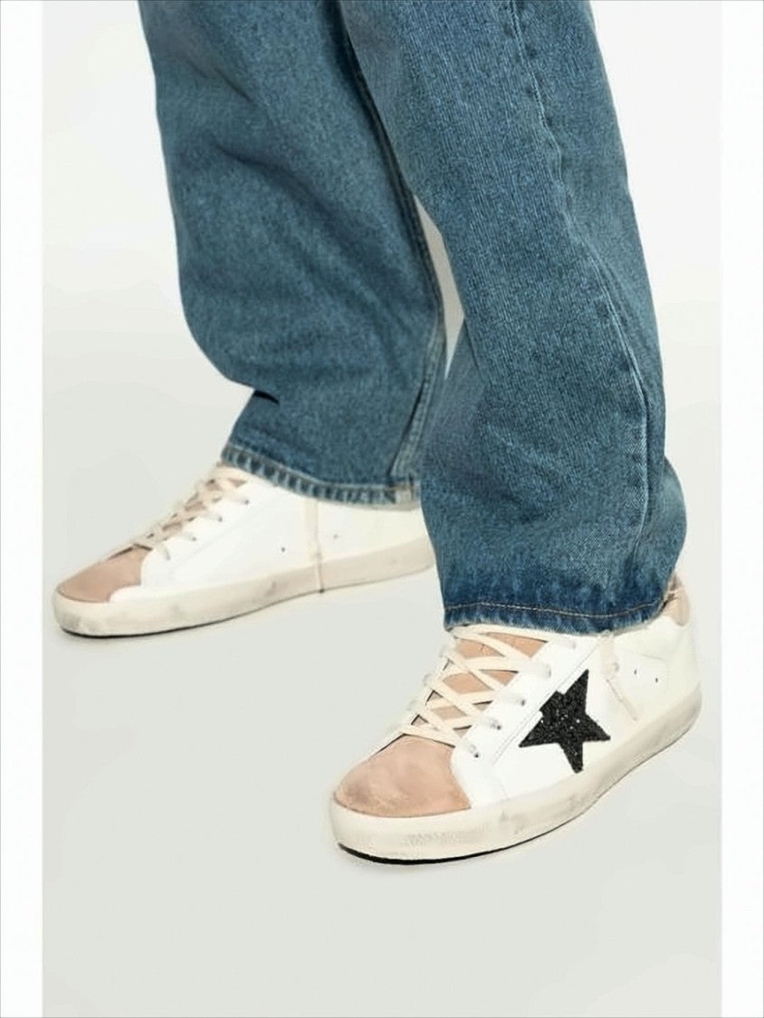 Low-Top White Leather Sneakers With Beige Suede Accents And Distressed Finish