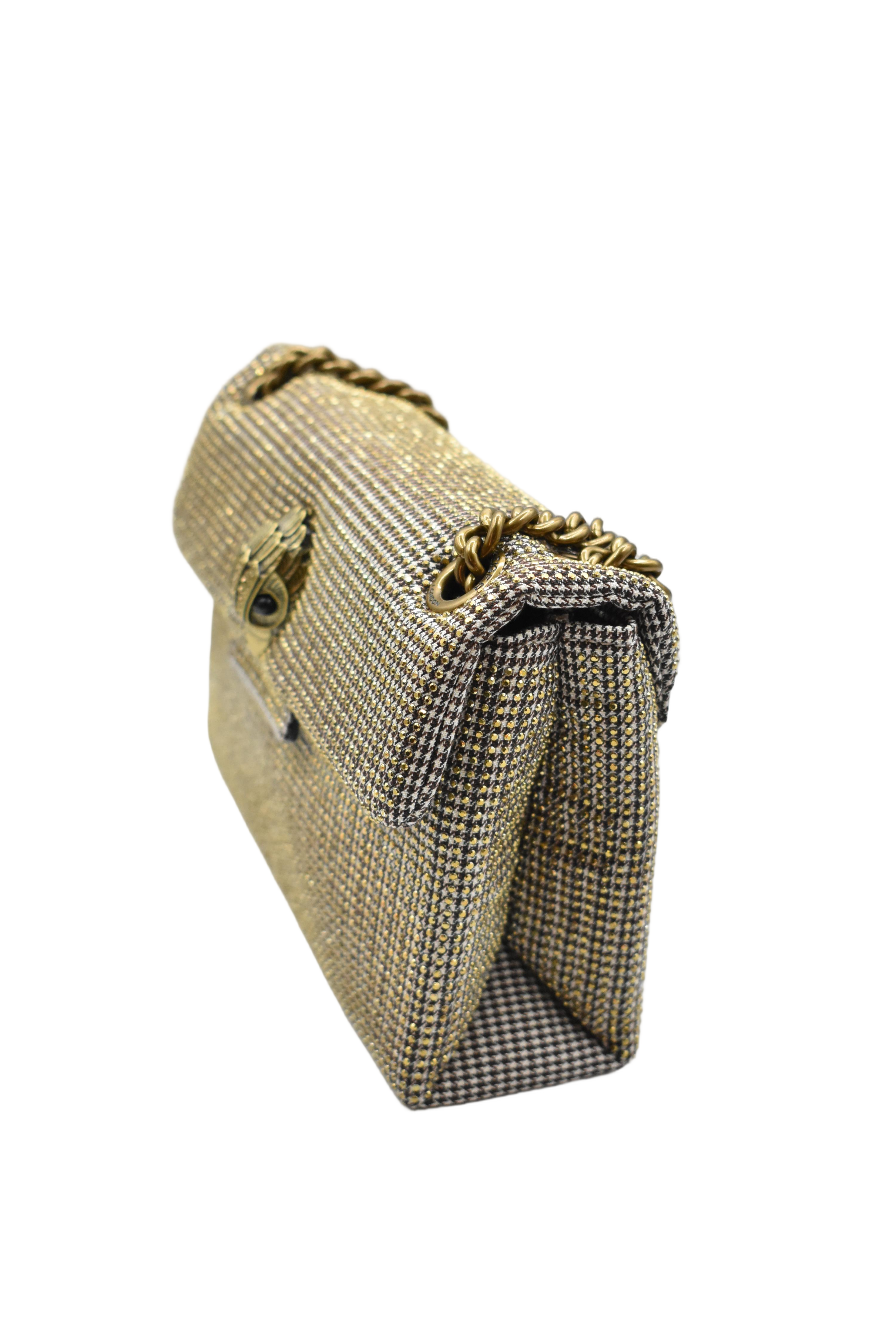 Textured Beige Handbag With Decorative Metallic Clasp
