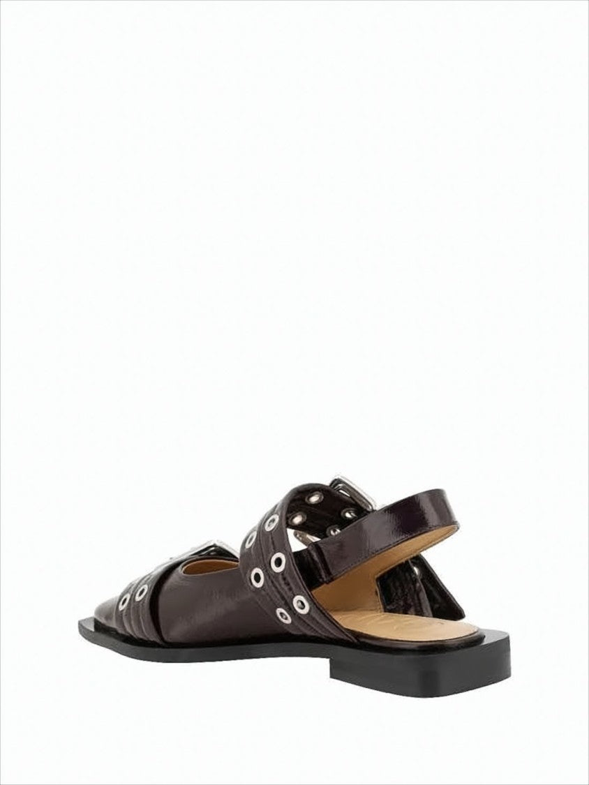 Sleek Slingback Flats With Pointed Toe And Bold Buckle Accents