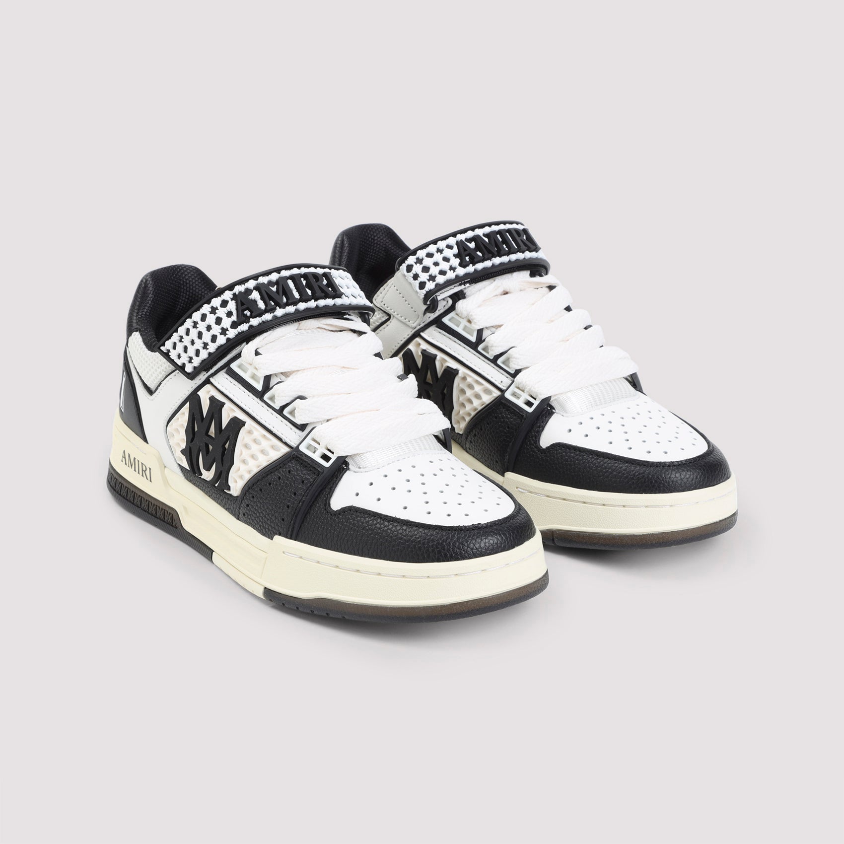 Low-Top Leather Sneakers With Textured Panels And Bold Branding
