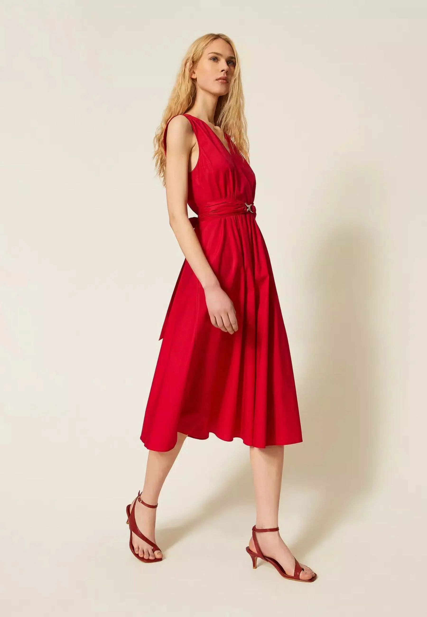 Sleeveless Midi Dress with Deep V-Neckline