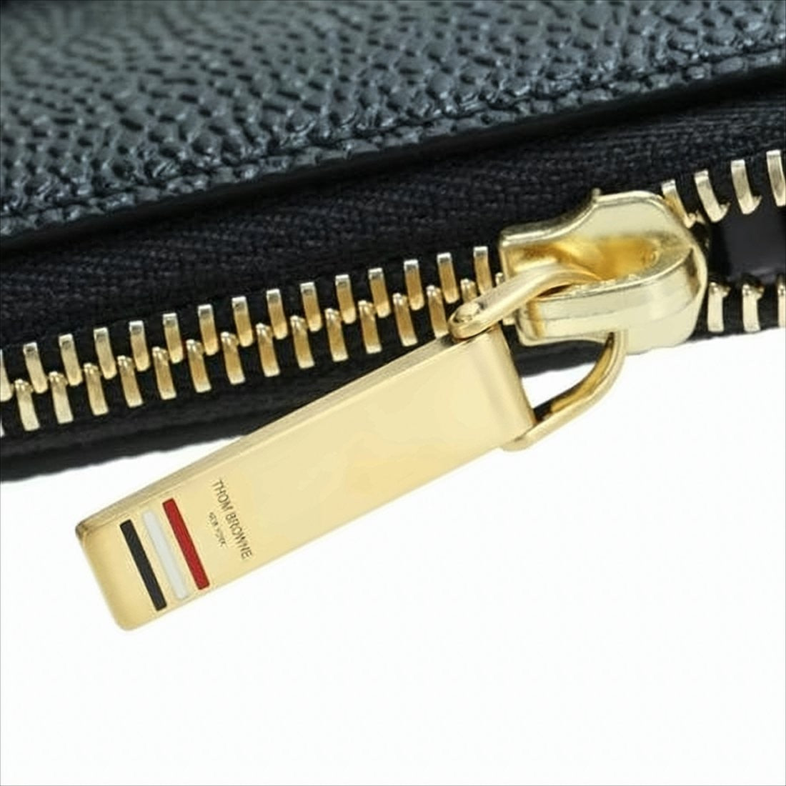 Textured Leather Clutch with Gold-Zipper Closure and Tricolor Accents