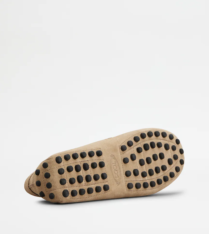 Classic Brown Leather Moccasins With Distinctive Detailing