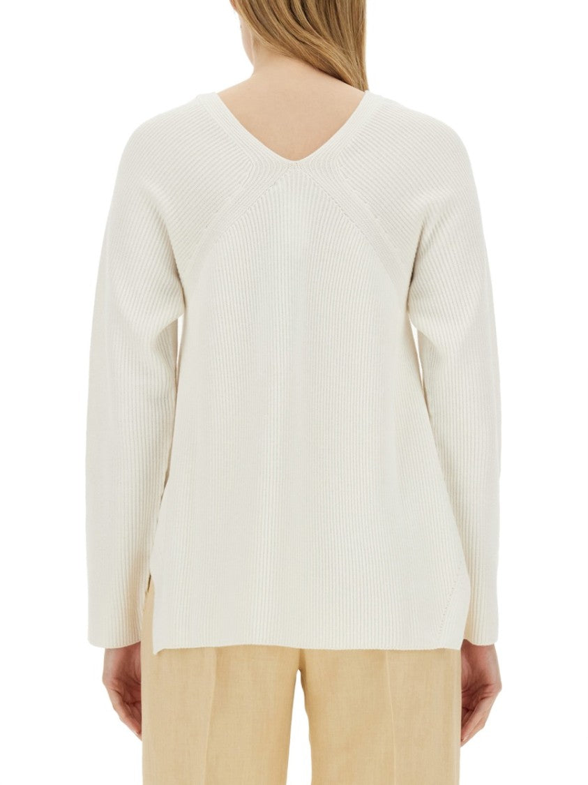V-Neck Sweater With Ribbed Texture And Side Slits