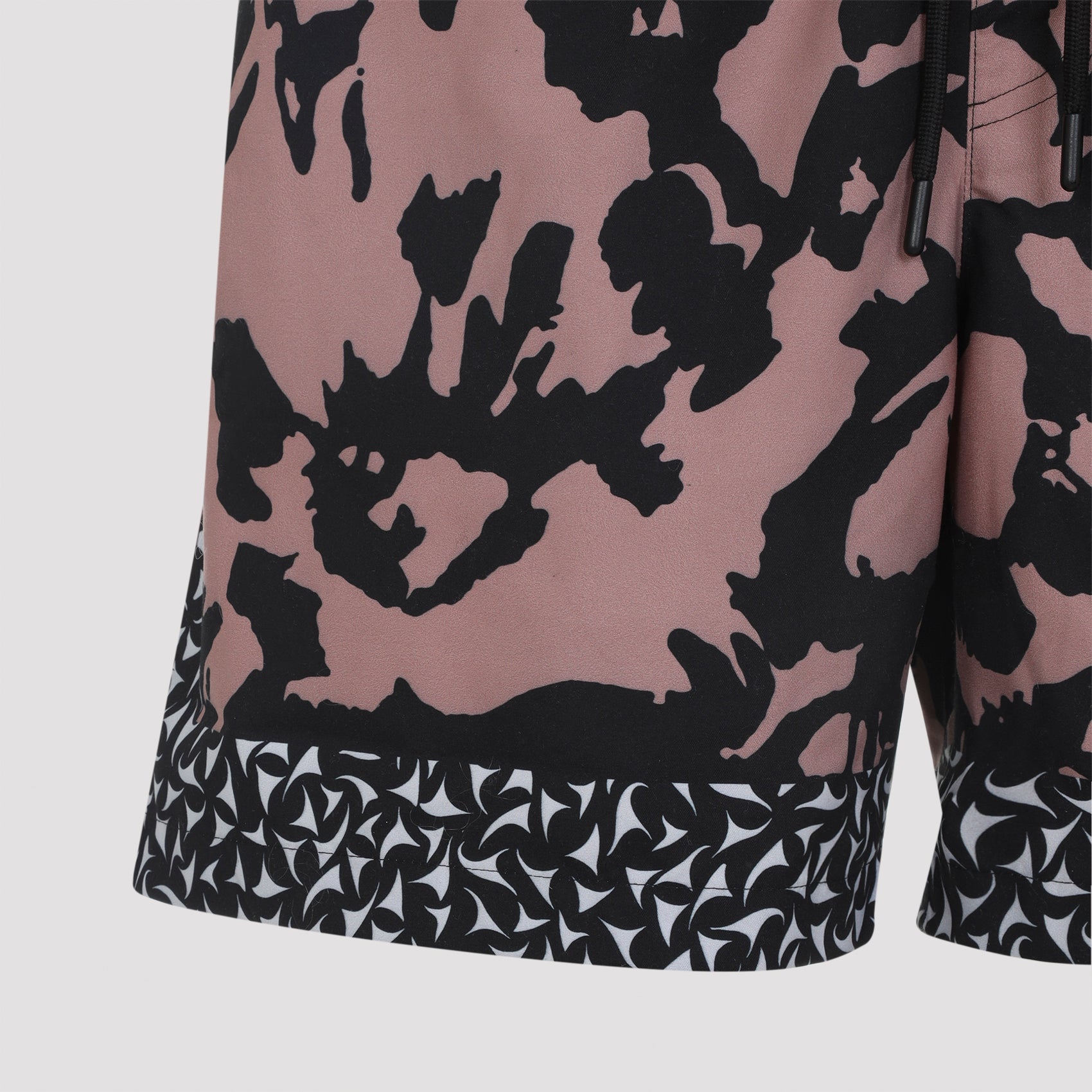 Abstract Pattern Swim Shorts with Geometric Border