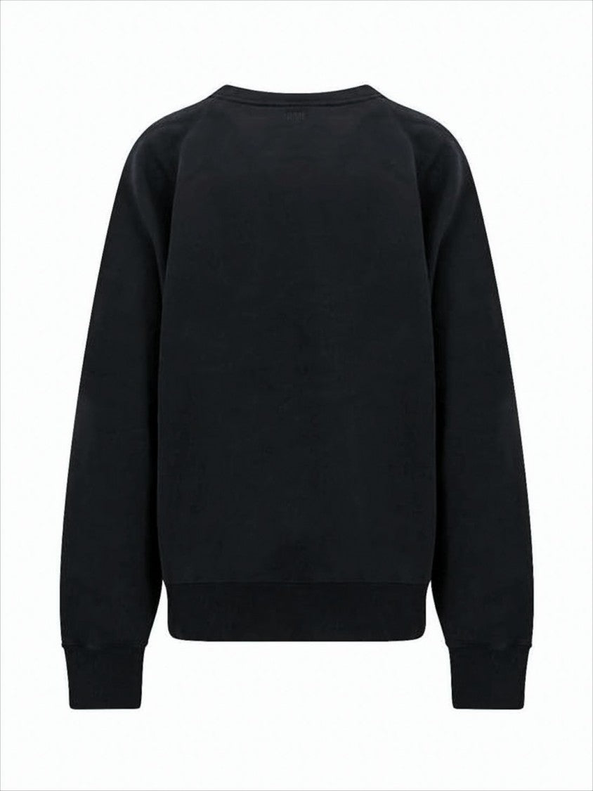 Black Long-Sleeve Top With Classic Crew Neckline And Ribbed Cuffs