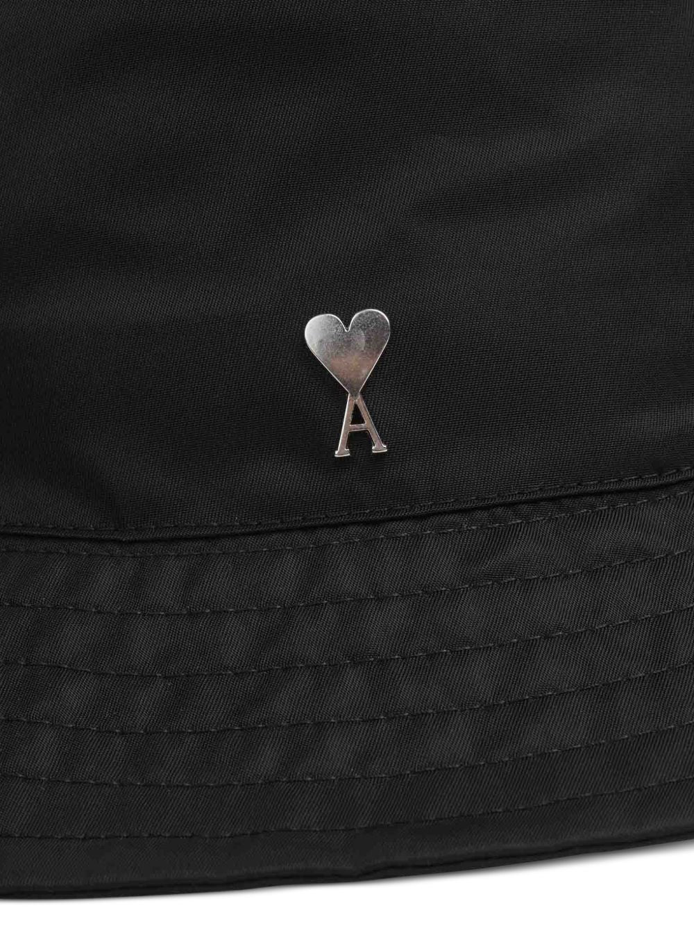 Rounded Brim Black Bucket Hat with Heart Emblem