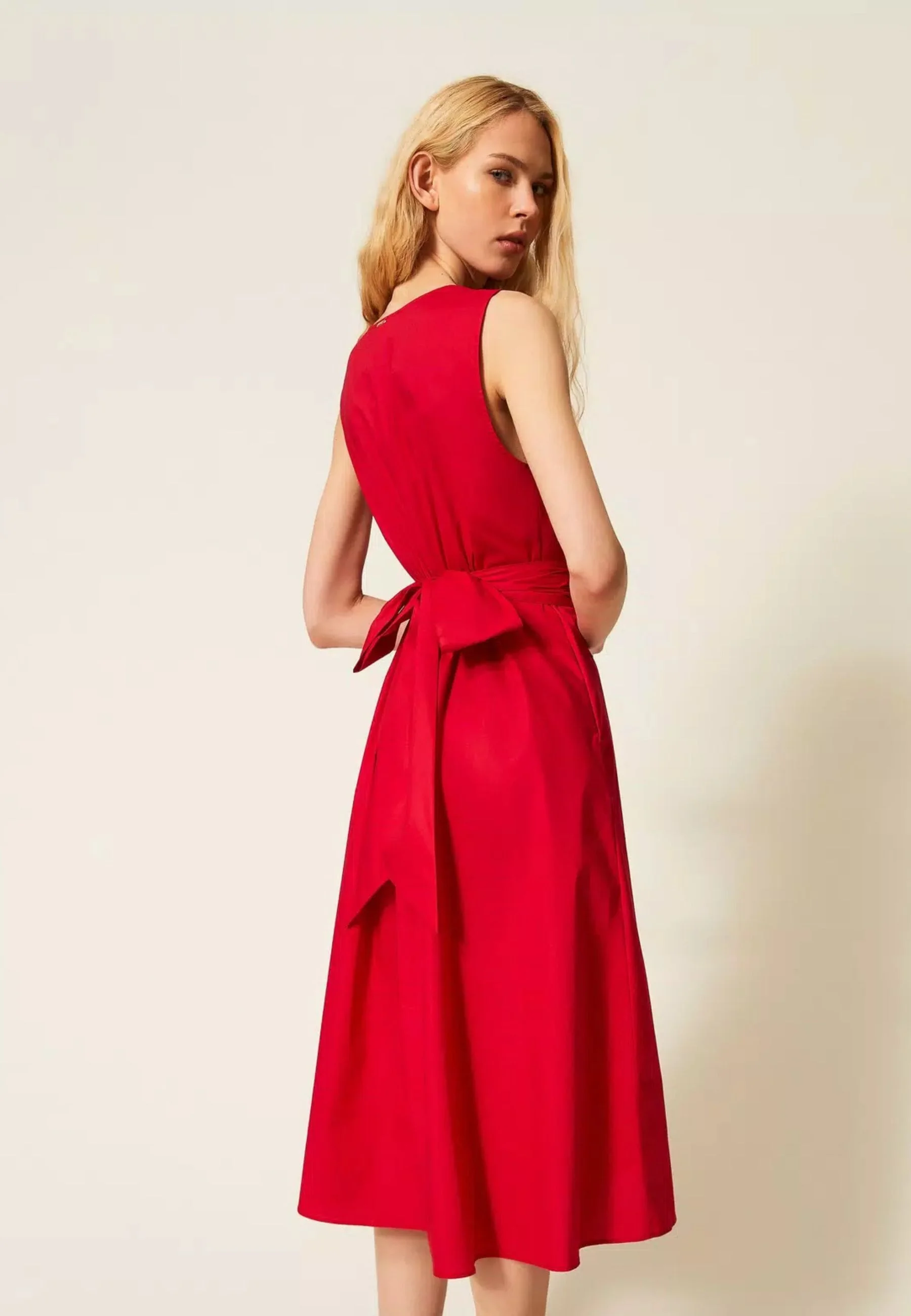 Sleeveless Midi Dress with Deep V-Neckline