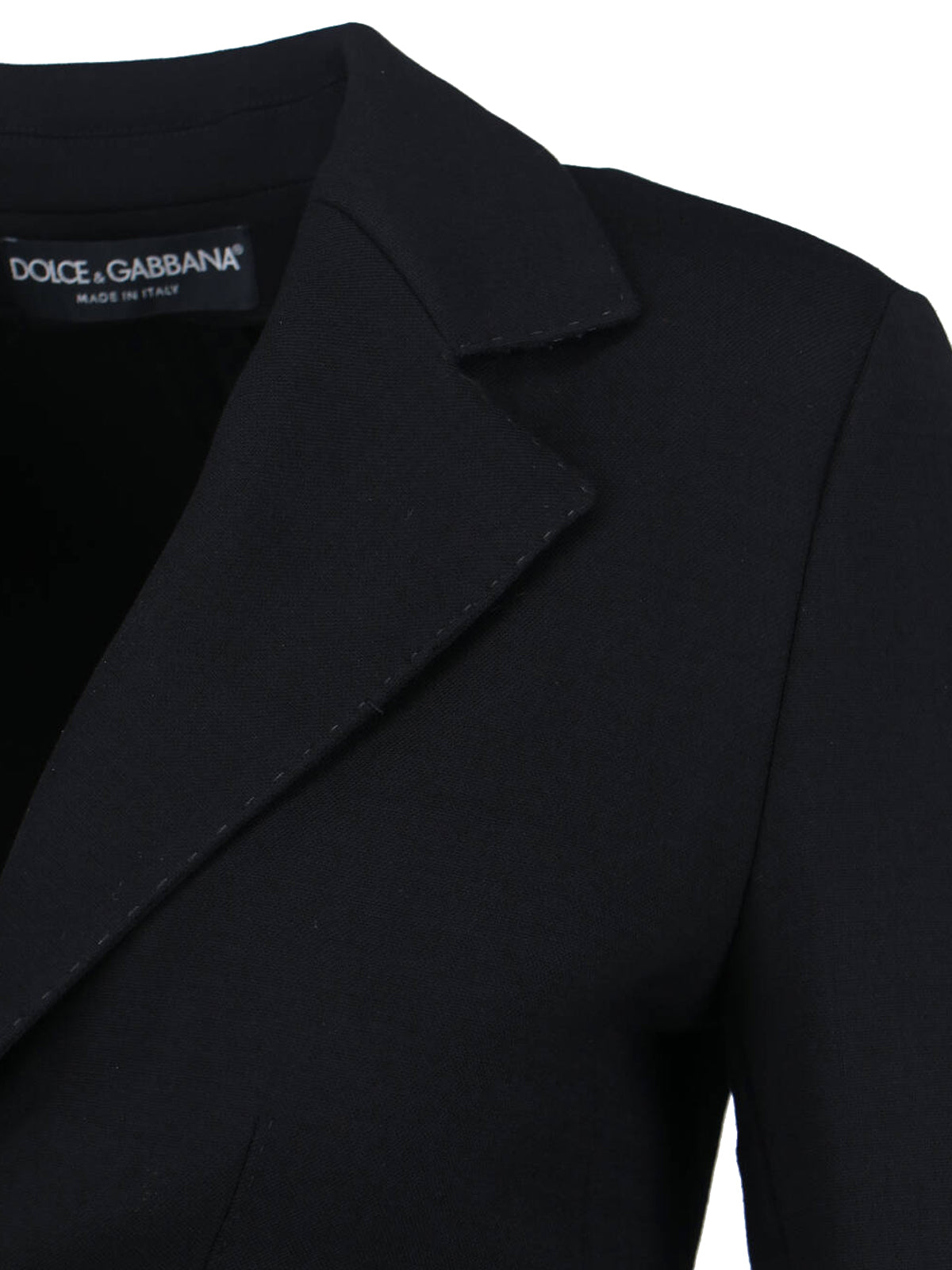 Tailored Black Jacket With Structured Shoulders And Minimalist Design