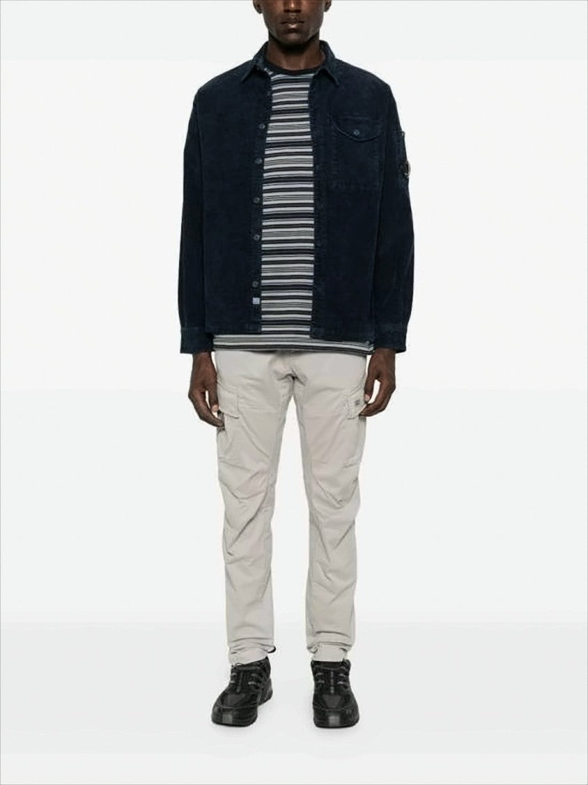 Navy Corduroy Jacket With Button-Up Front And Unique Lens Detail