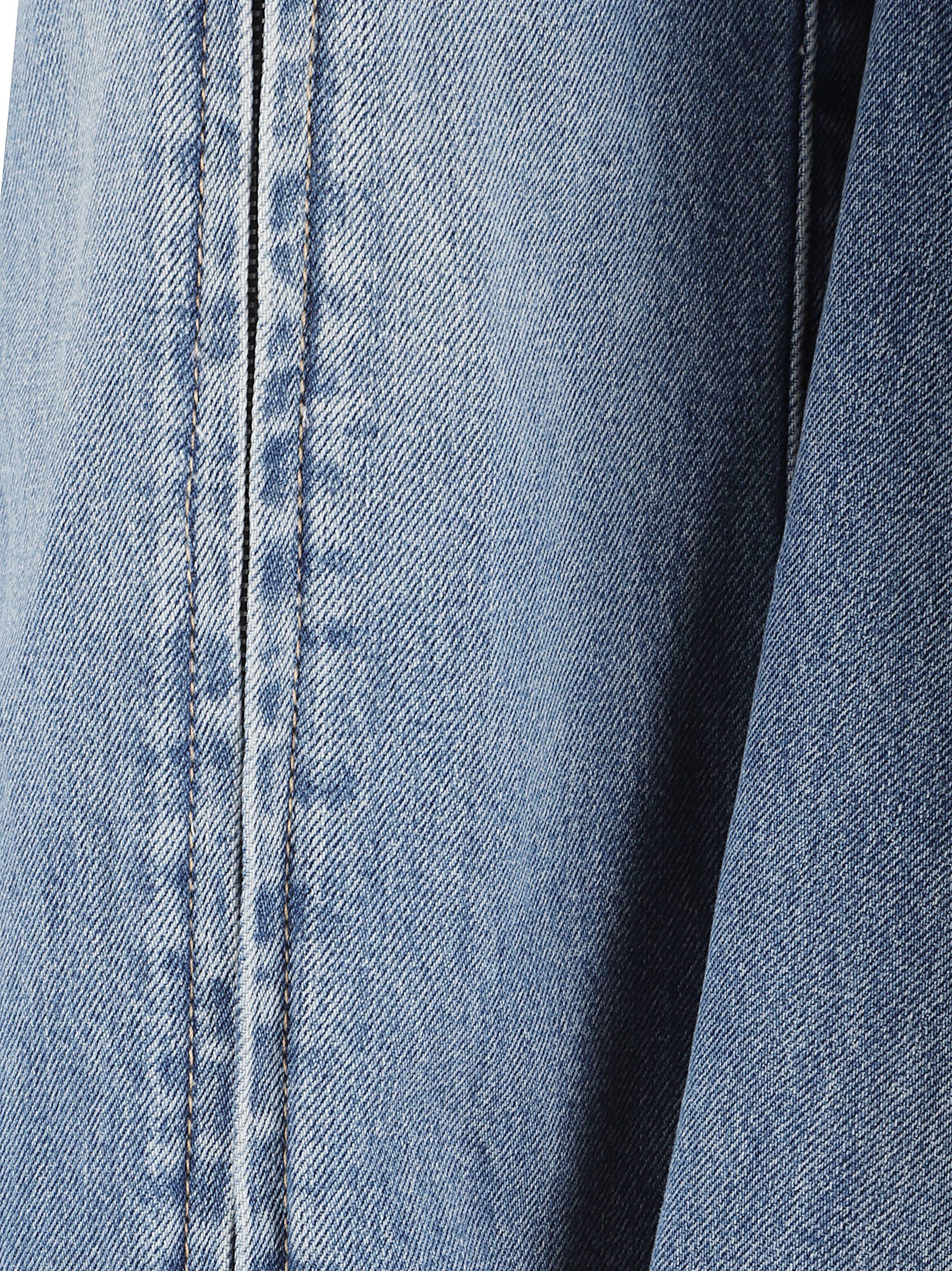 Slightly Flared Light Blue Jeans with Raw Hem