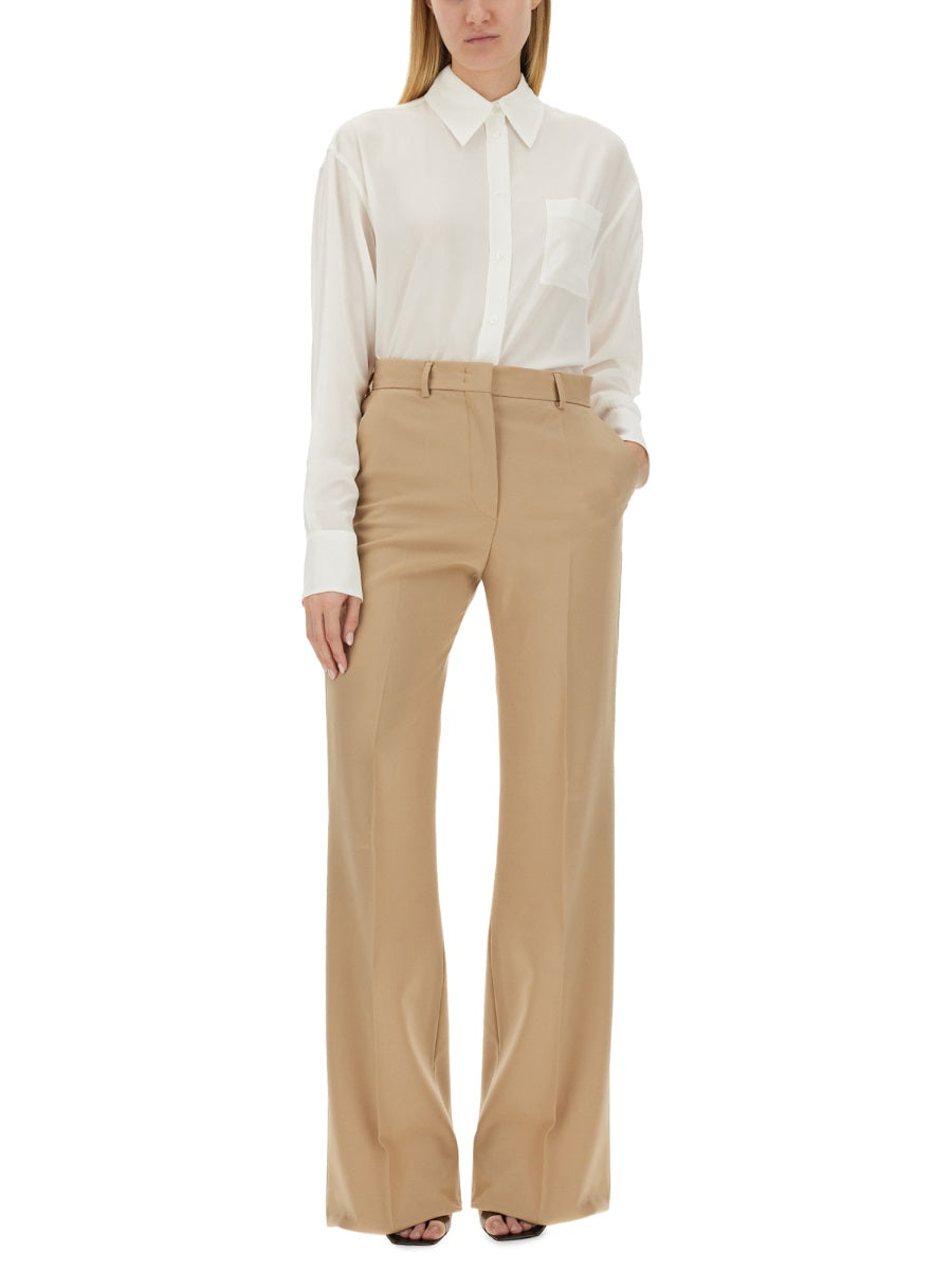 Classic White Shirt With Pointed Collar And Pleat Detail