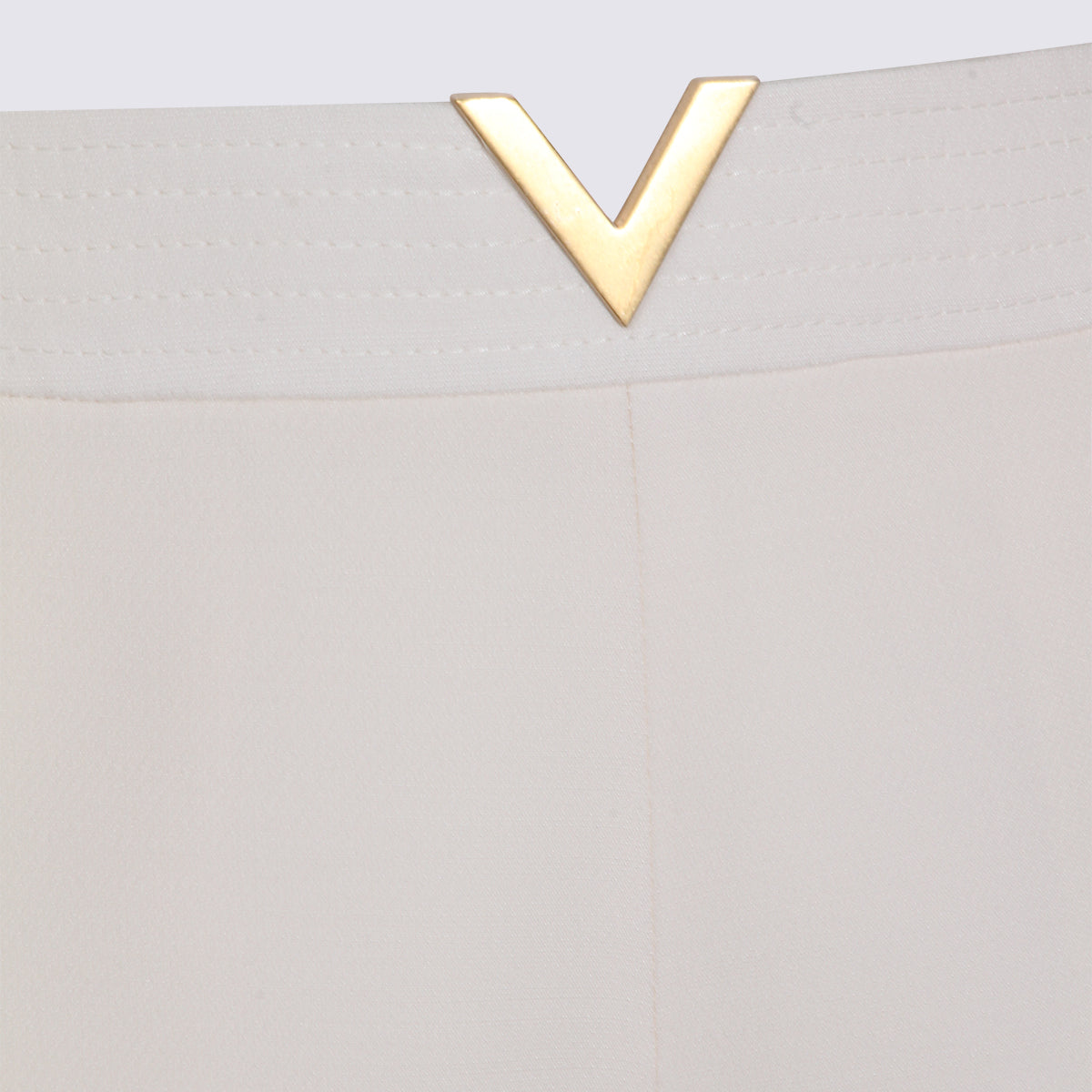 High-Waisted Tailored Shorts with Gold V-Detail