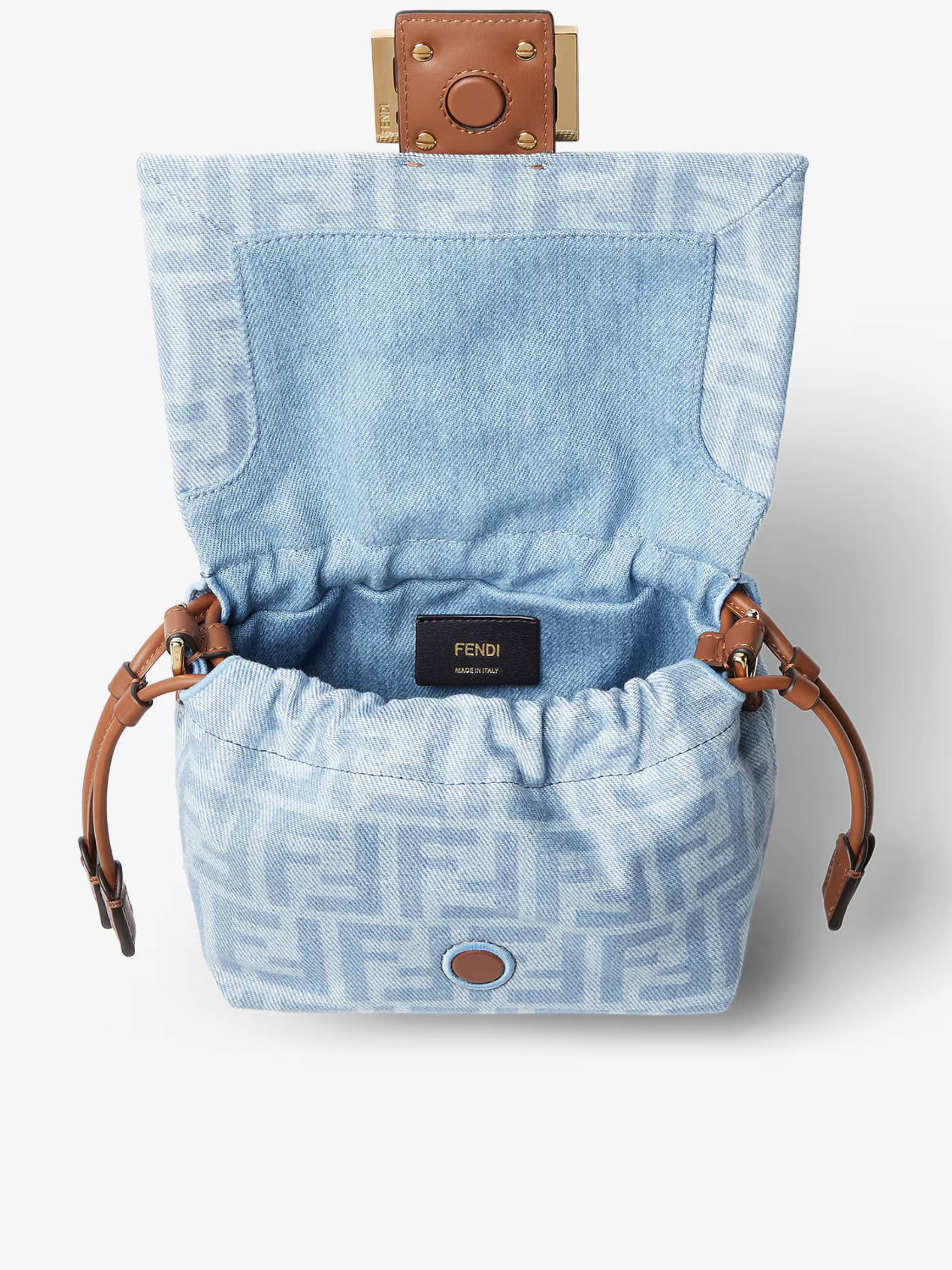 Soft Rectangular Baguette Bag with Monogram Pattern and Leather Accents