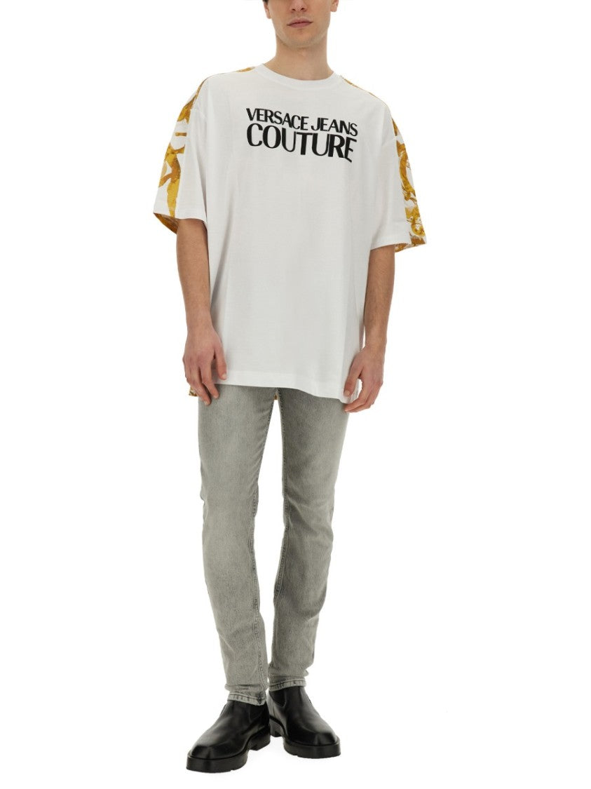 Oversized T-Shirt With Bold Logo And Intricate Patterned Sleeves