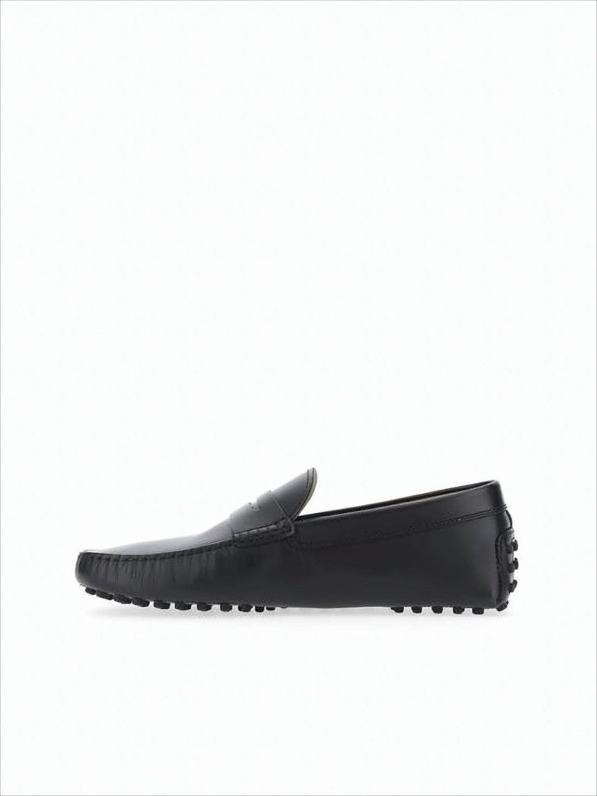 Refined Black Leather Loafers with Penny Strap and Moccasin Stitching
