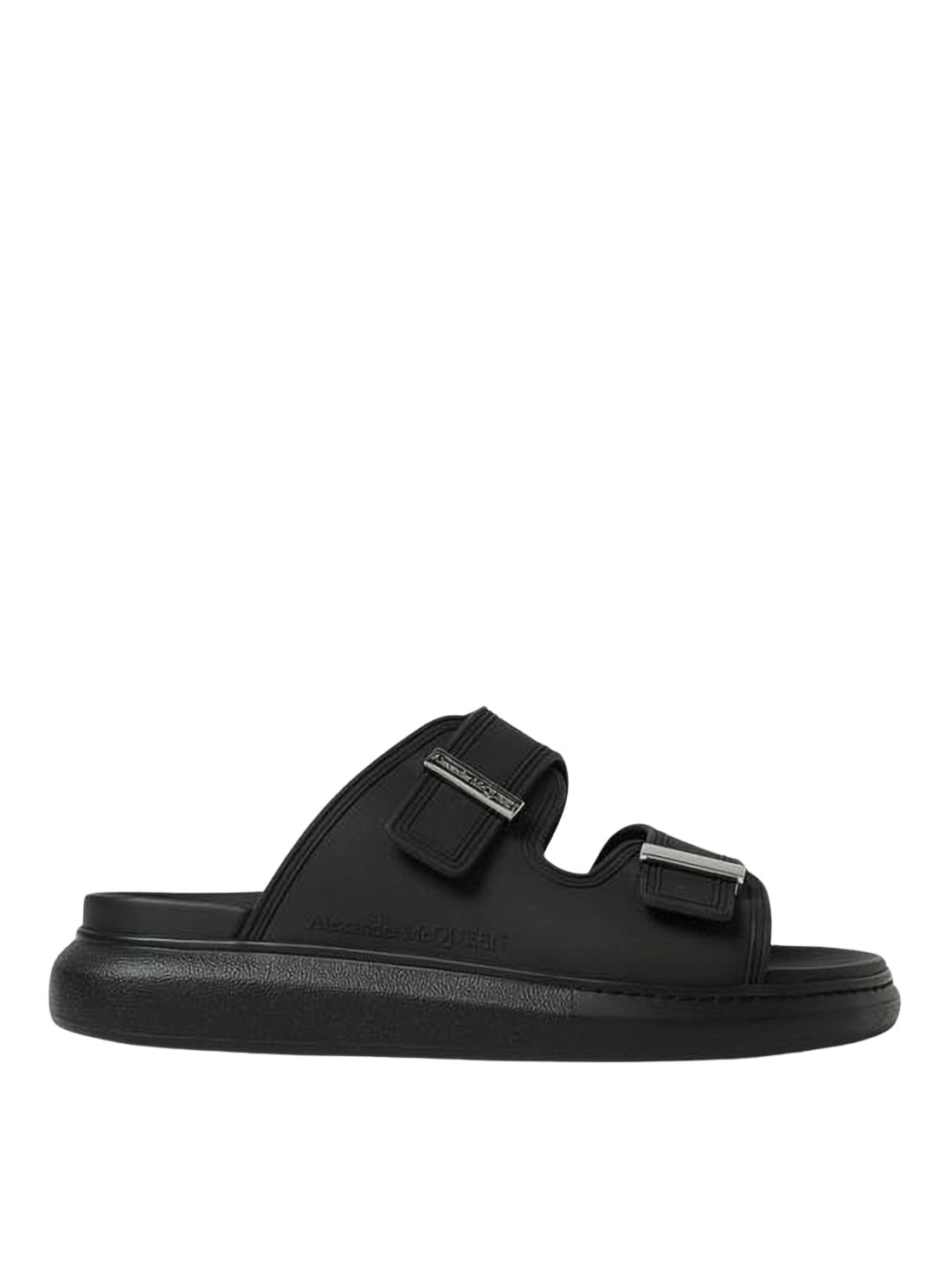 Sleek Black Rubber Mules